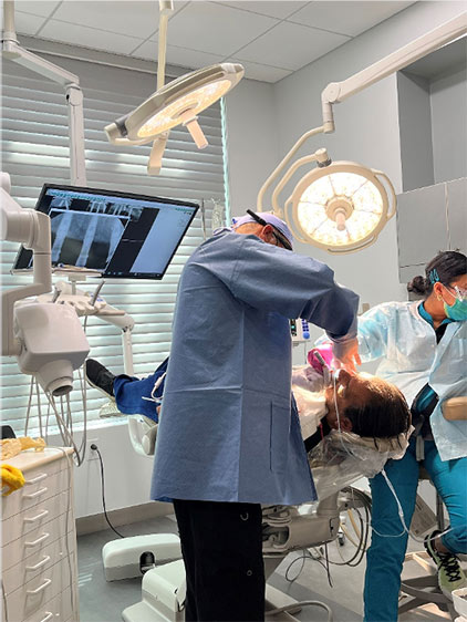Doctor Performing Dental_Implant Procedure